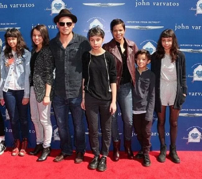 Keisha chambers and family in John Varvatos 10th Annual Stuart House Benefit
