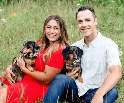 Alaina Marie Scott and Matte with their pet dogs