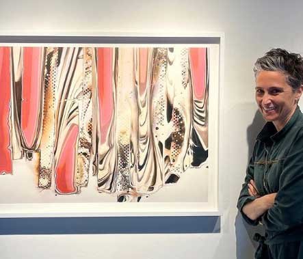 Alexandra Flaunting her Photographs at Exhibition